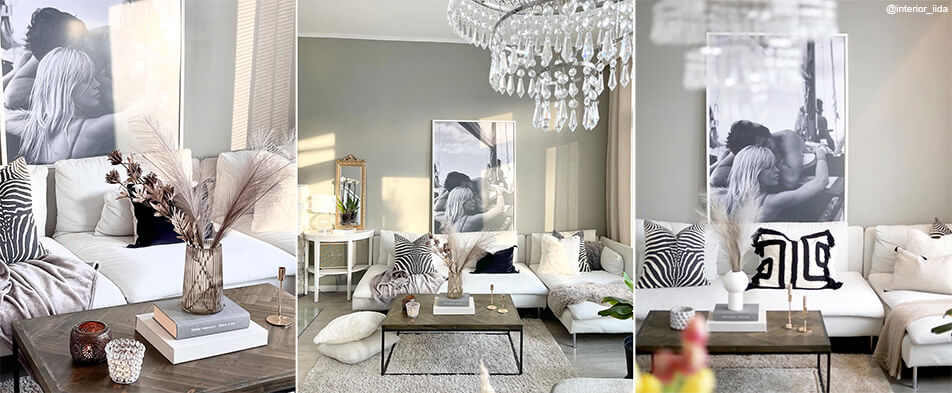 Vit stor tavelram med svartvitt foto i ljust vardagsrum